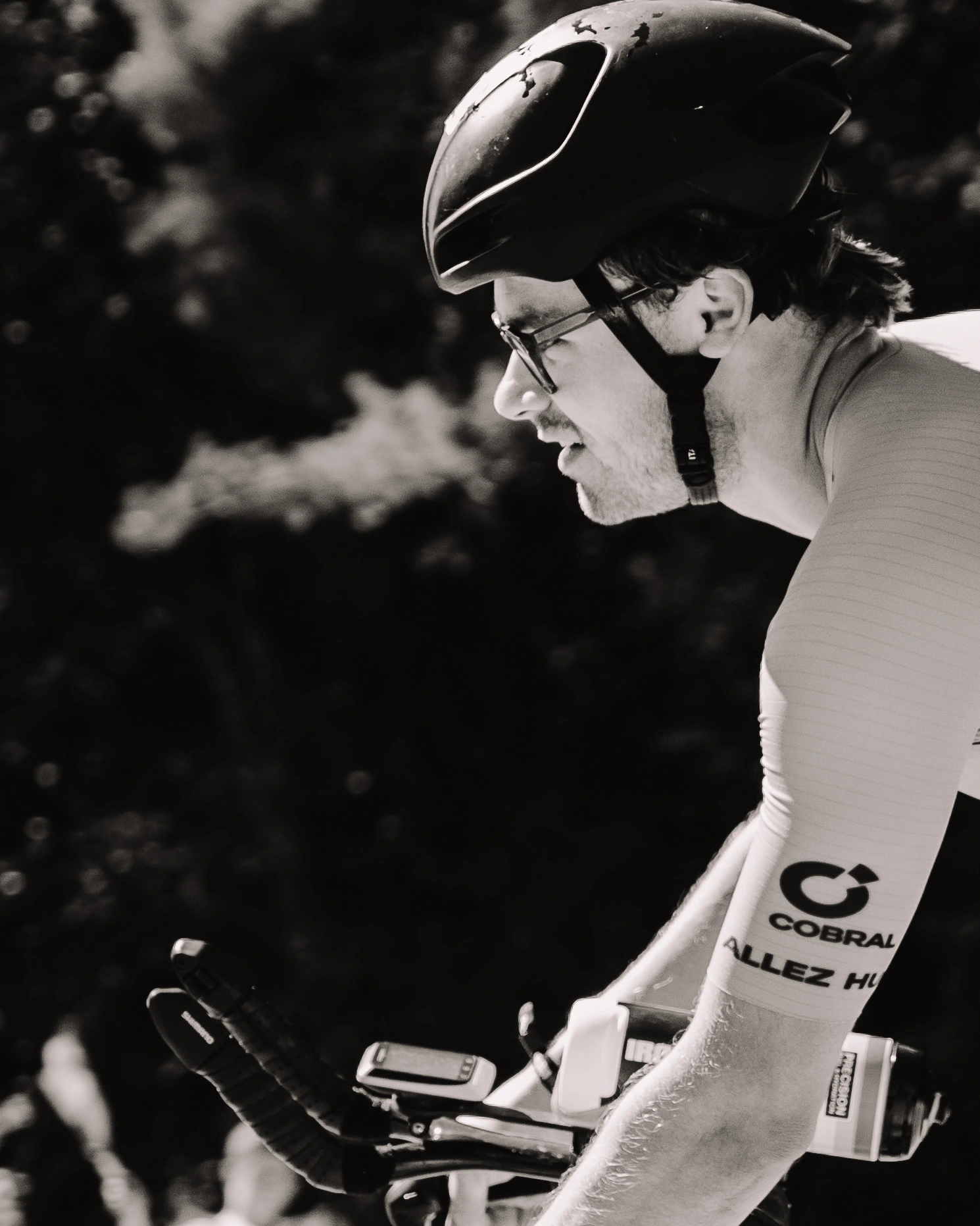 Close sporting detail of Stephen on a road bike