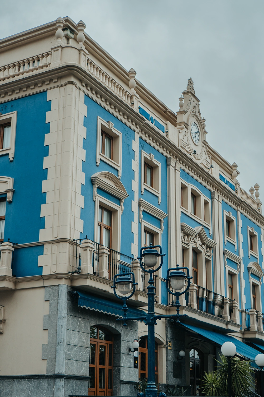 Blue and white architecture on a street in Bilbao